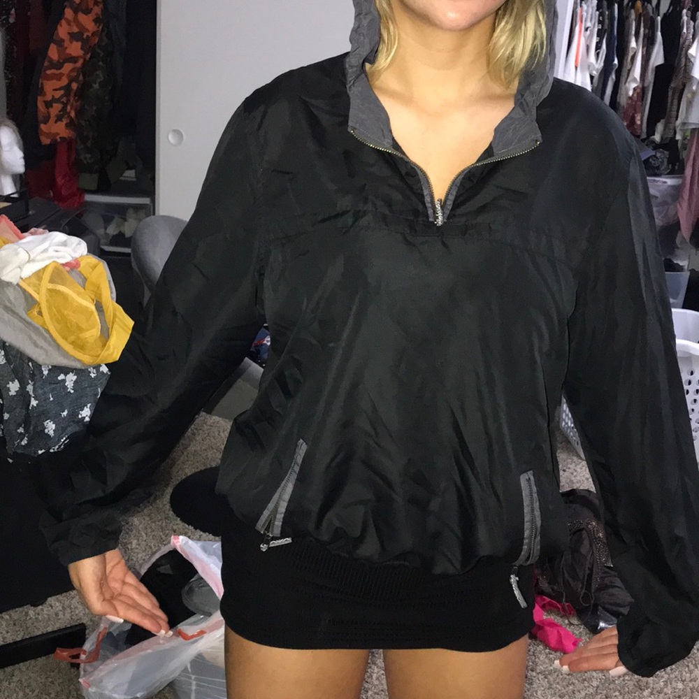 Black windbreaker grey hoodie